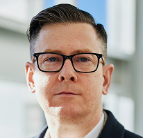 Executivo Alexander Hughes, CEO de empresa especializada em negociação de criptomoedas 